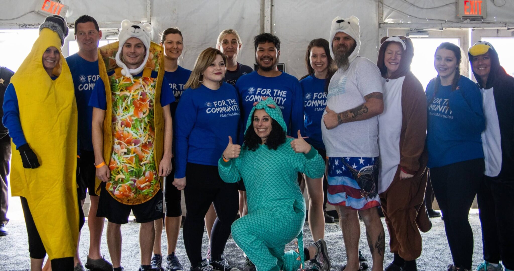 Mackenthun's Team in For The Community T-shirts ready to jump in the lake for Polar Plunge.