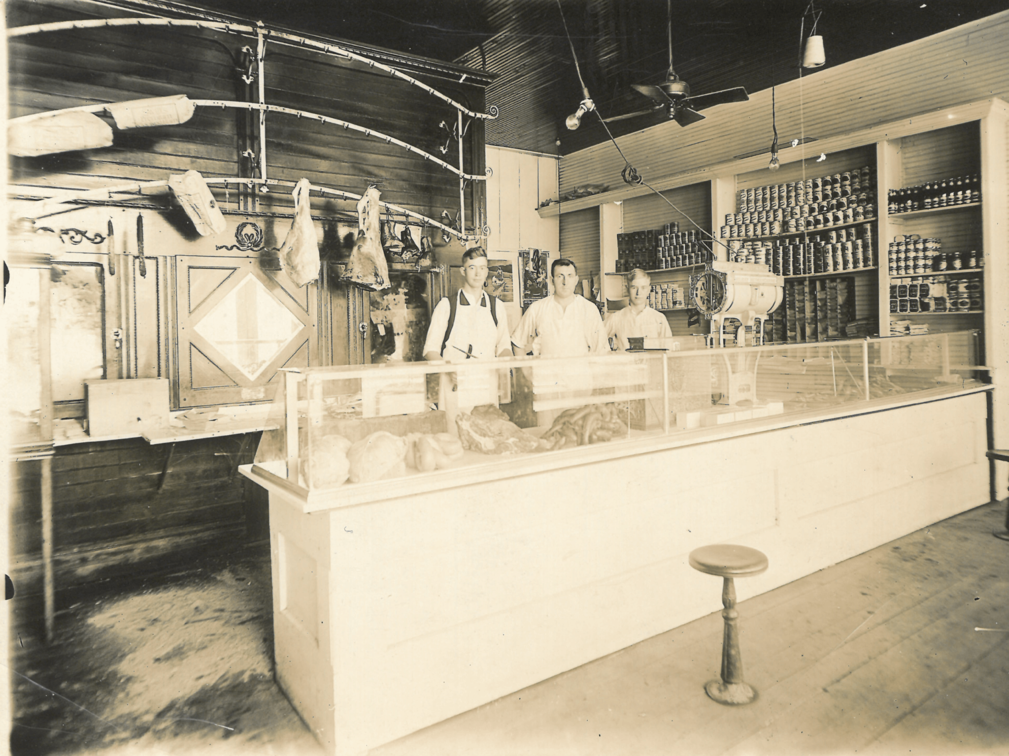 The original Waconia Store in 1916. Behind the counter is, from left to right, Arthur Mackenthun, J. H. Dickhudt and Harvey Mackethun. The original store is said to have been bought from Dickhudt.