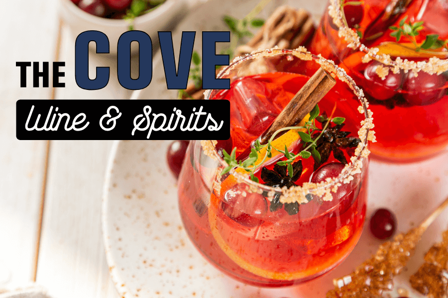 Cranberry drink with The cove wine & spirits logo