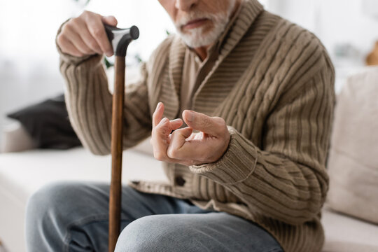 Elderly man with Parkinson's Disease. Image source: Lightfield Studios | Adobe Stock