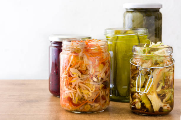 A variety of fermented foods in jars. Image source: etorres69 | Getty Images
