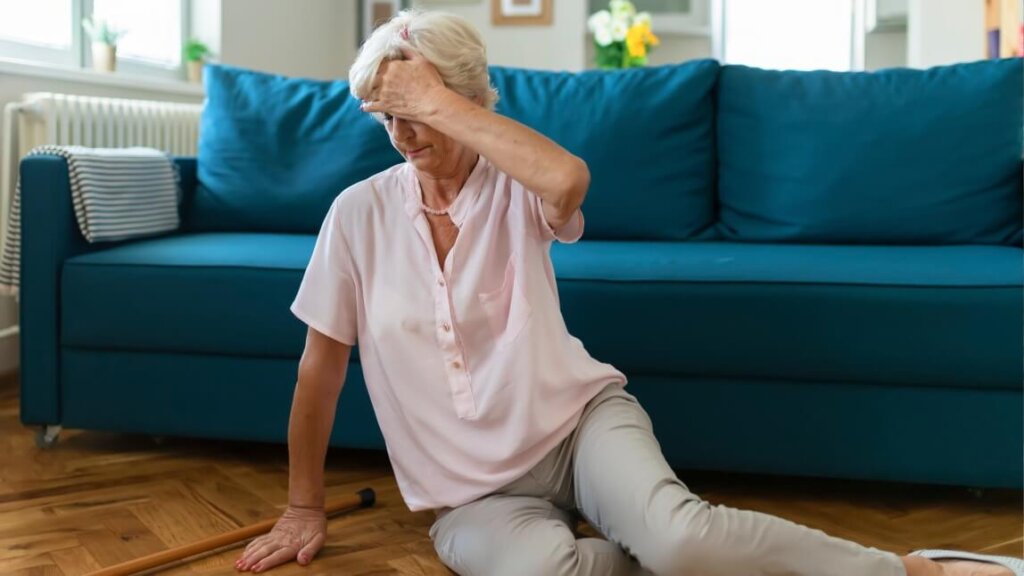 A woman who has fallen onto the floor. Image source: Kaia Health