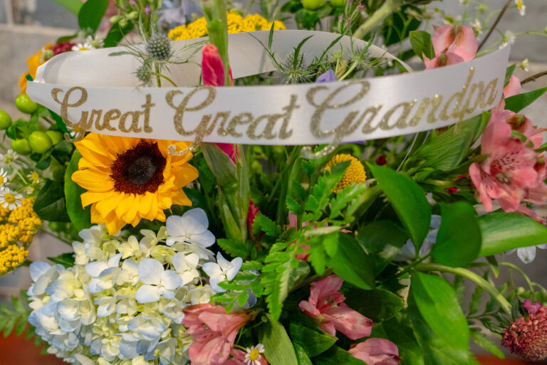 event floral bouquet showcasing ribbon and flowers